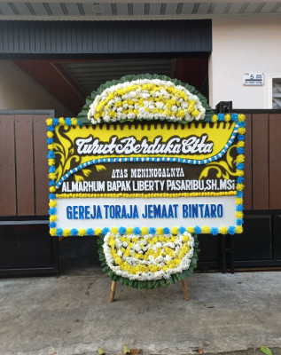 Papan Bunga Duka di Bantaran