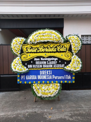 Papan Bunga Duka di Bantaran