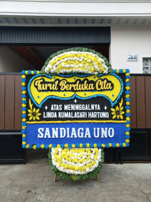 Papan Bunga Duka di Bantaran